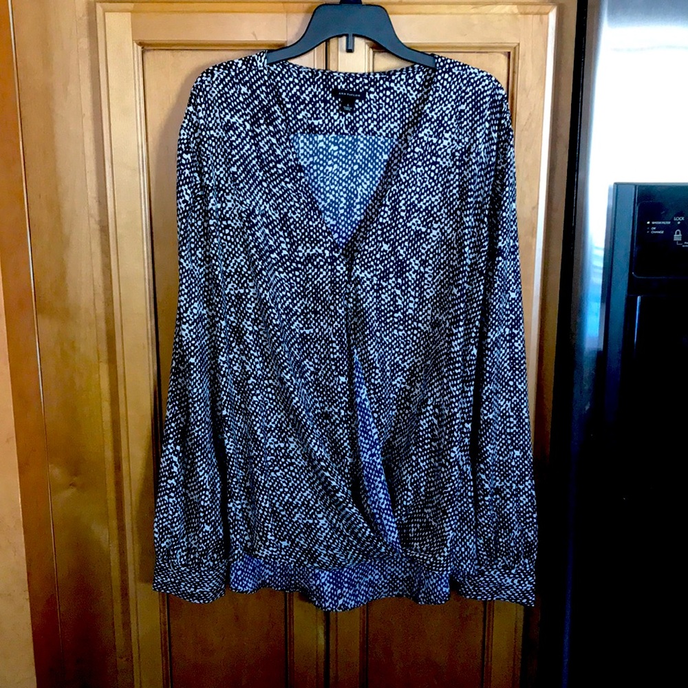 Two beautiful woman’s blouses,.Ann Taylor black/white and Calvin Klein
